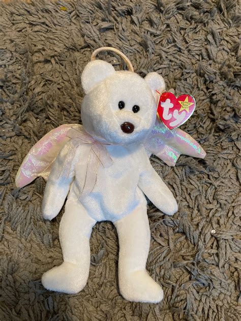 This one had different gold wings and a halo making it more beautiful and valued than its predecessor. . Halo beanie baby